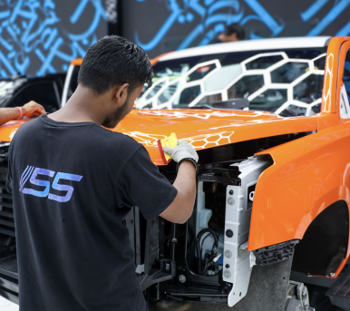 Adjusting car panel.