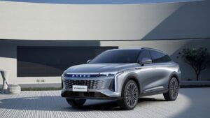 Silver Exeed RX SUV showcasing sleek design and LED headlights.